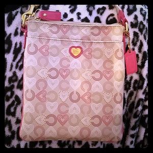 Pink and beige Coach purse
